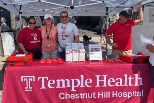 Temple Health-Chestnut Hill Hospital team members at our tent at the Fall for the Arts Festival.